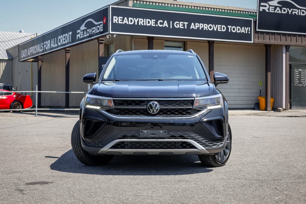 Volkswagen Taos outside the Ready Ride showroom
